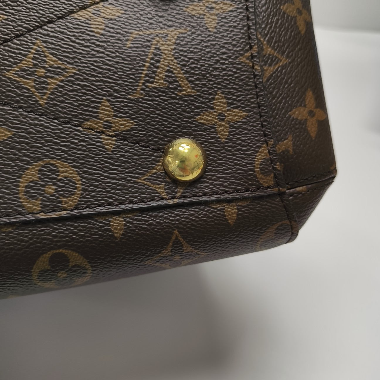 MONTAIGNE Monogram Coated Canvas Brown