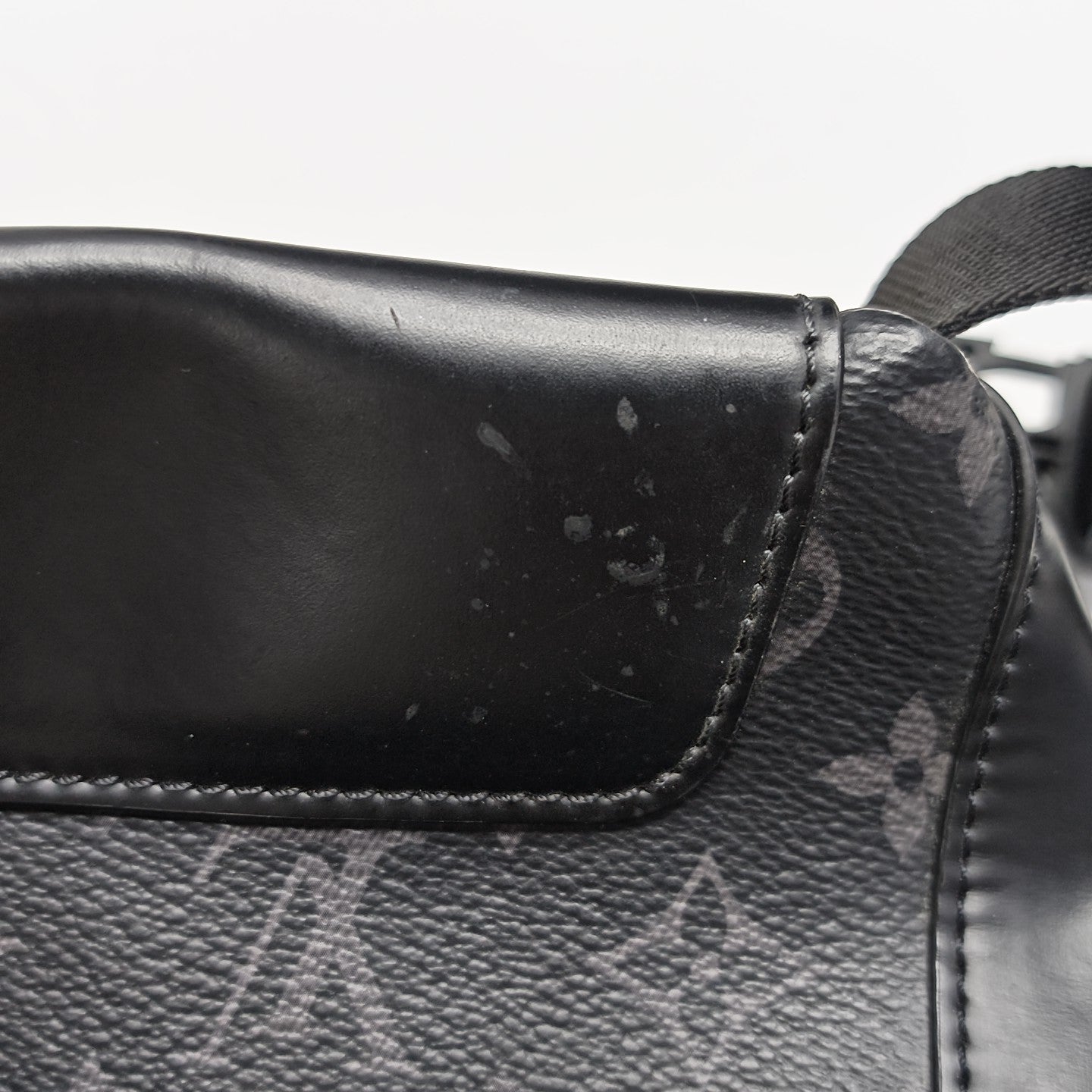 VOYAGER PM Monogram Coated Canvas Black