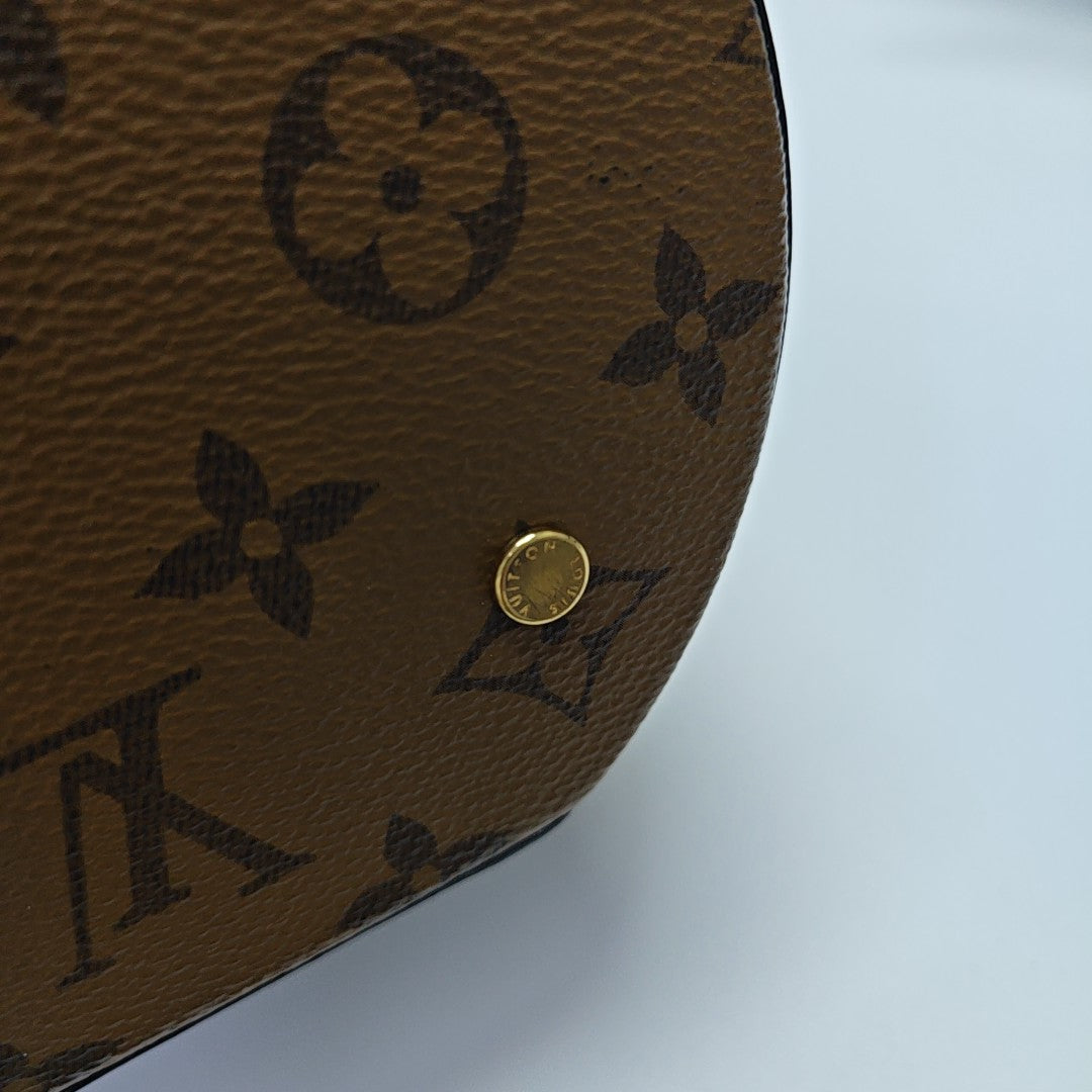CANNES PM Monogram Coated Canvas Brown