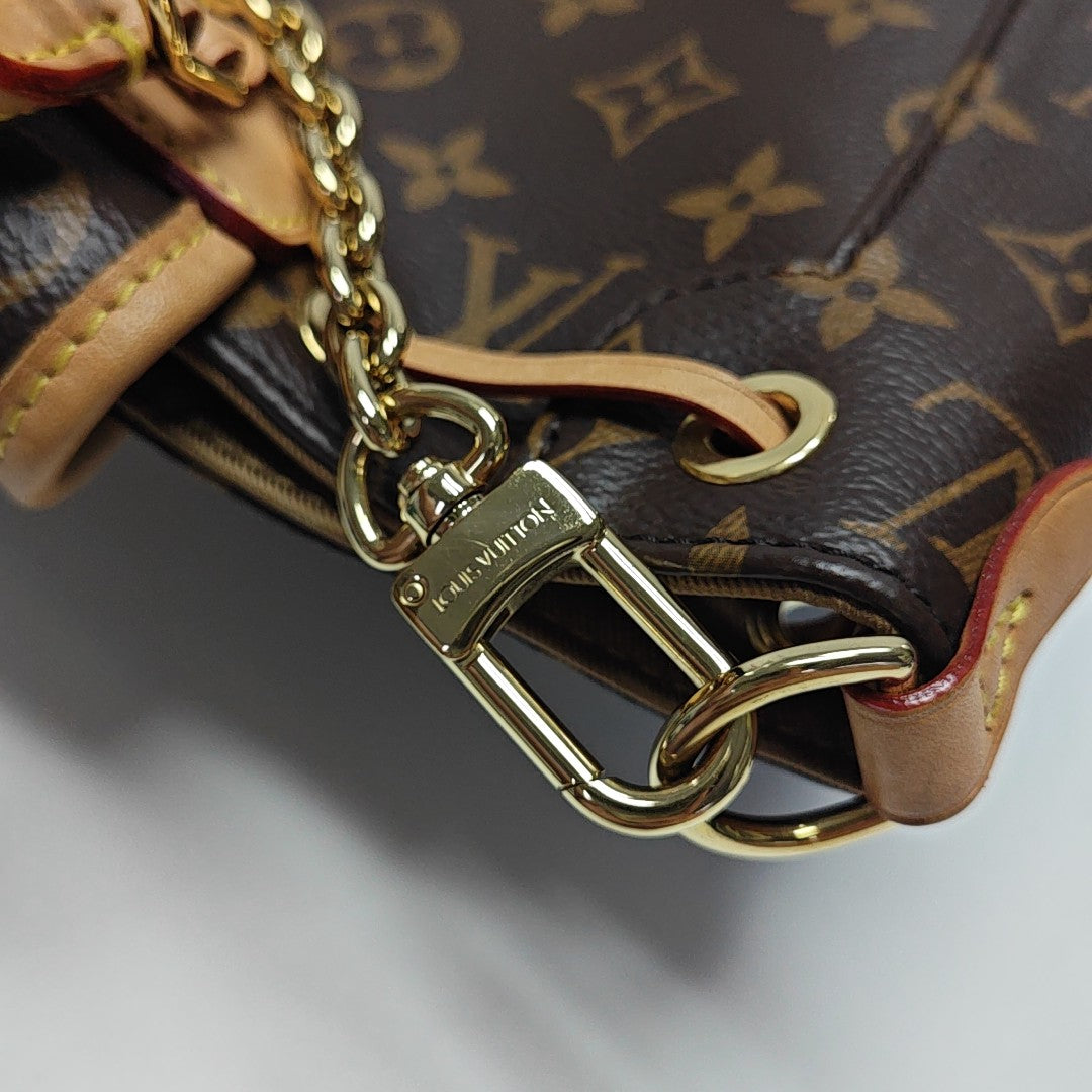 EXCURSION PM Monogram Coated Canvas Brown