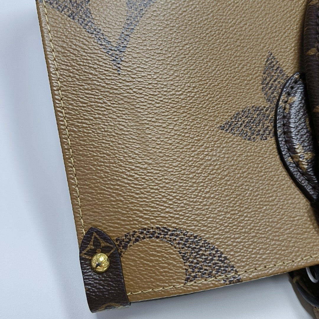 ONTHEGO MM Monogram Coated Canvas Brown