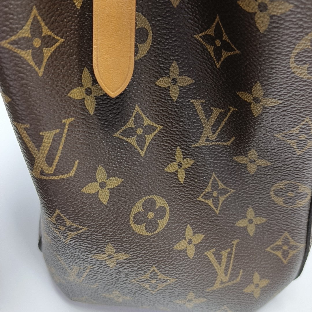 MONTAIGNE GM Monogram Coated Canvas Brown