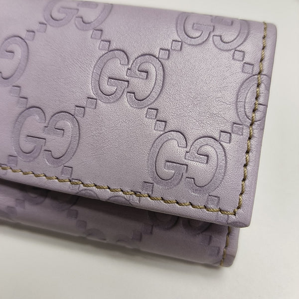 Monogram Calfskin Key Pouch Purple