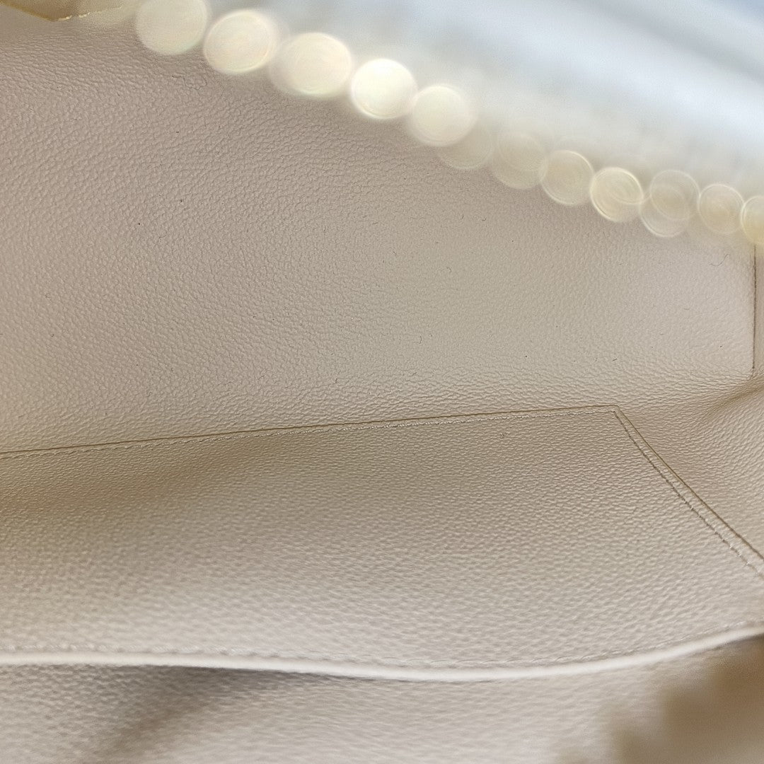Monogram Coated Canvas Extra Large White