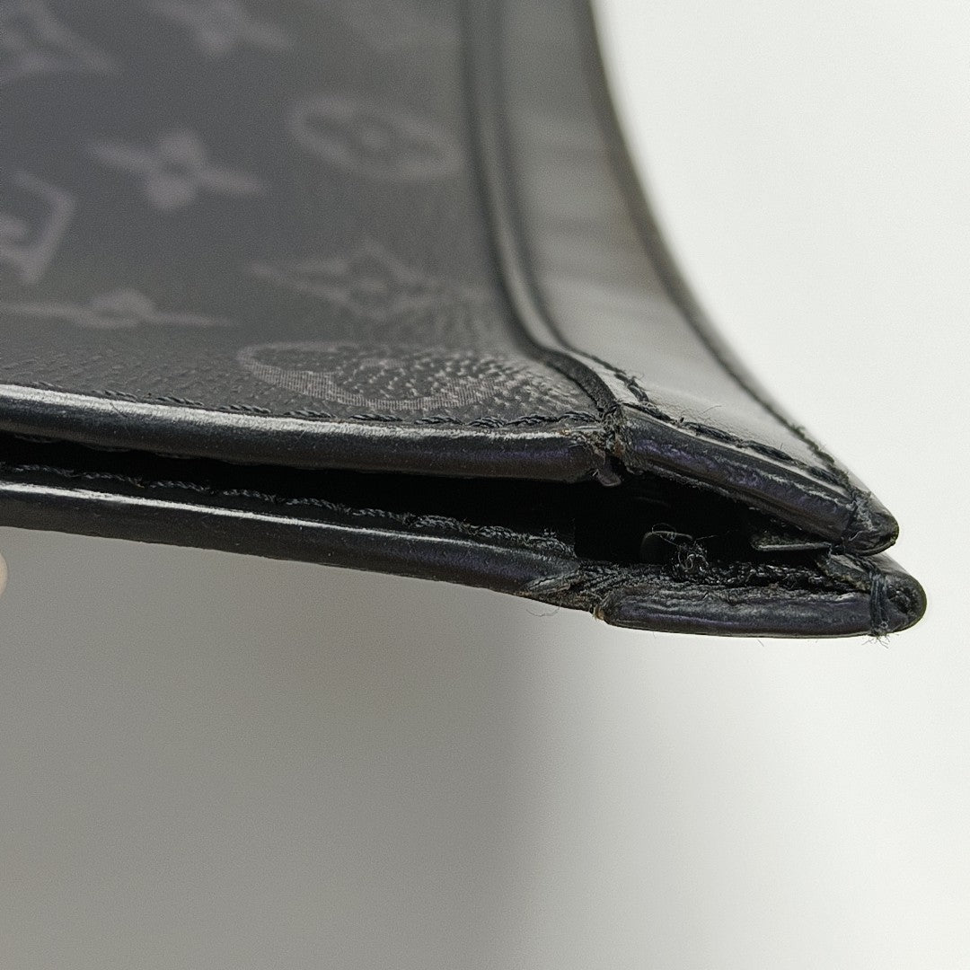 Pochette Voyag MM Monogram Coated Canvas Black