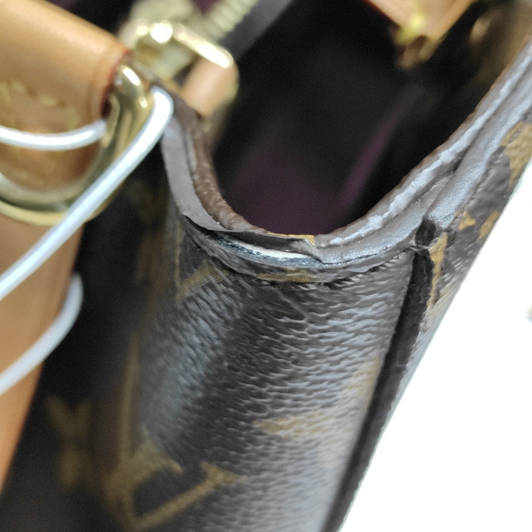 MONTAIGNE GM Monogram Coated Canvas Brown