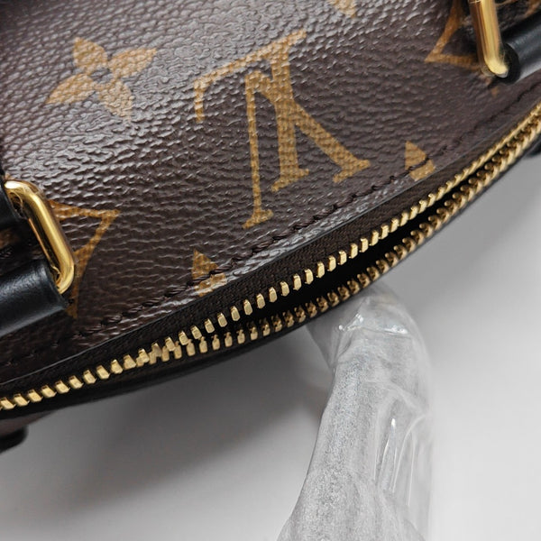 PETITE MALLE Monogram Coated Canvas Brown