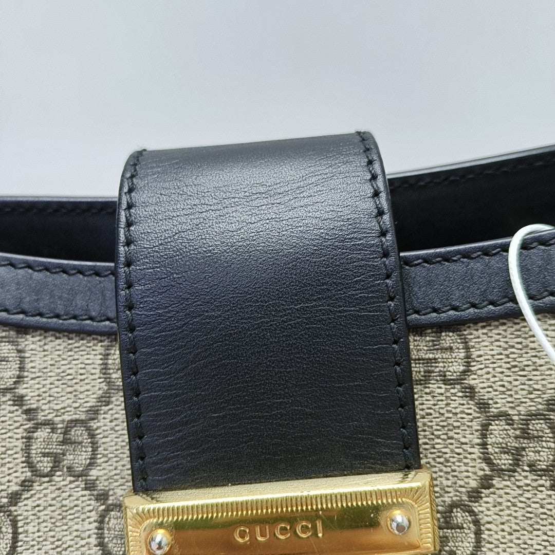 Padlock Small Monogram Coated Canvas Beige