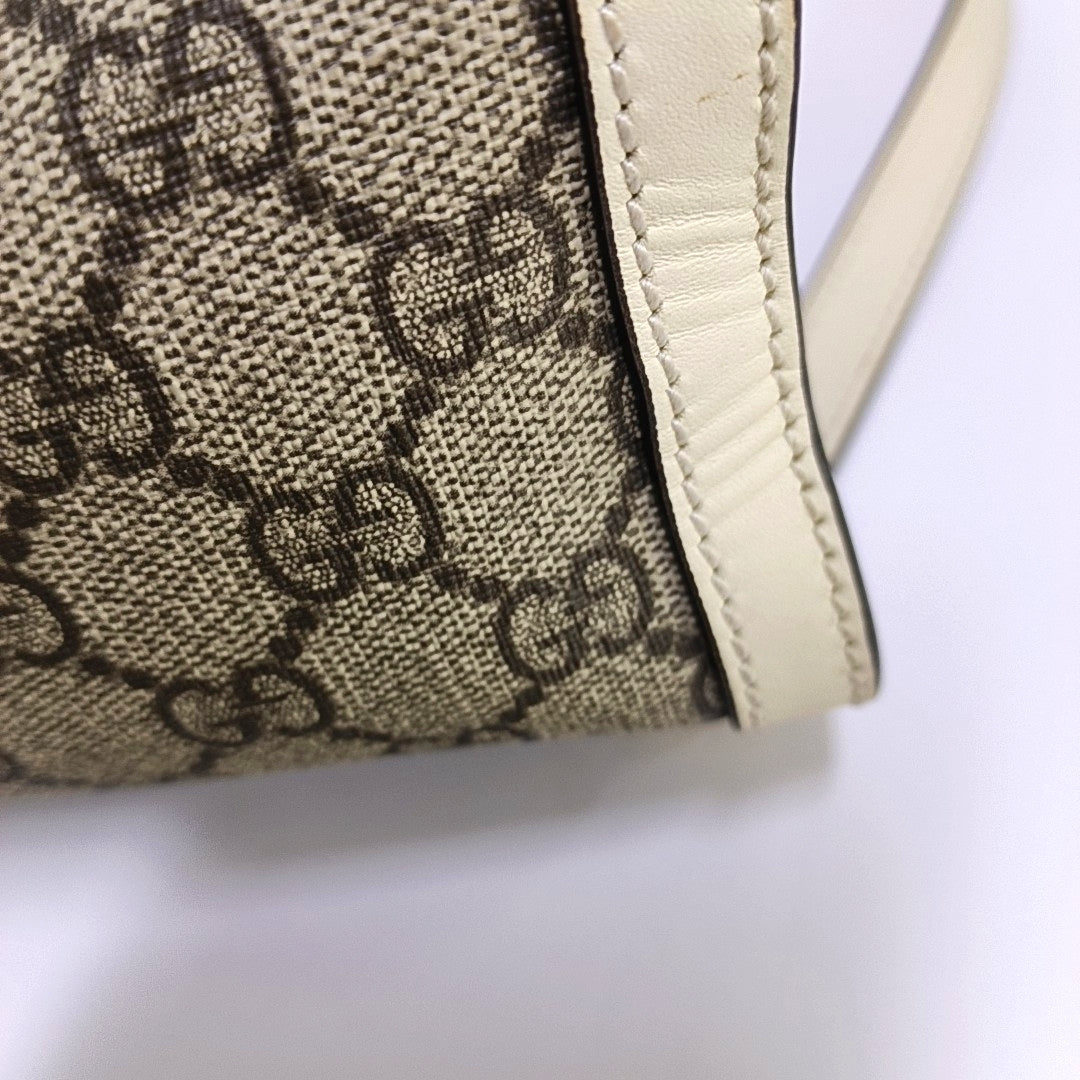 Padlock Small Monogram Coated Canvas Beige
