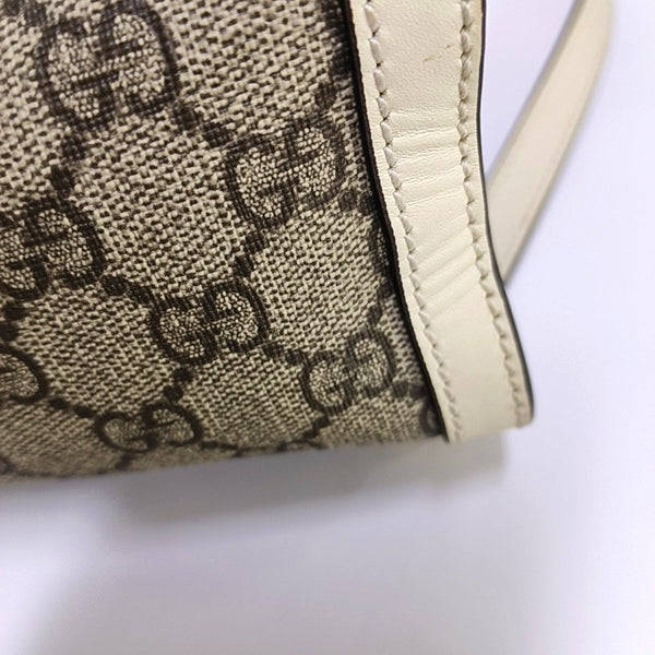 Padlock Small Monogram Coated Canvas Beige