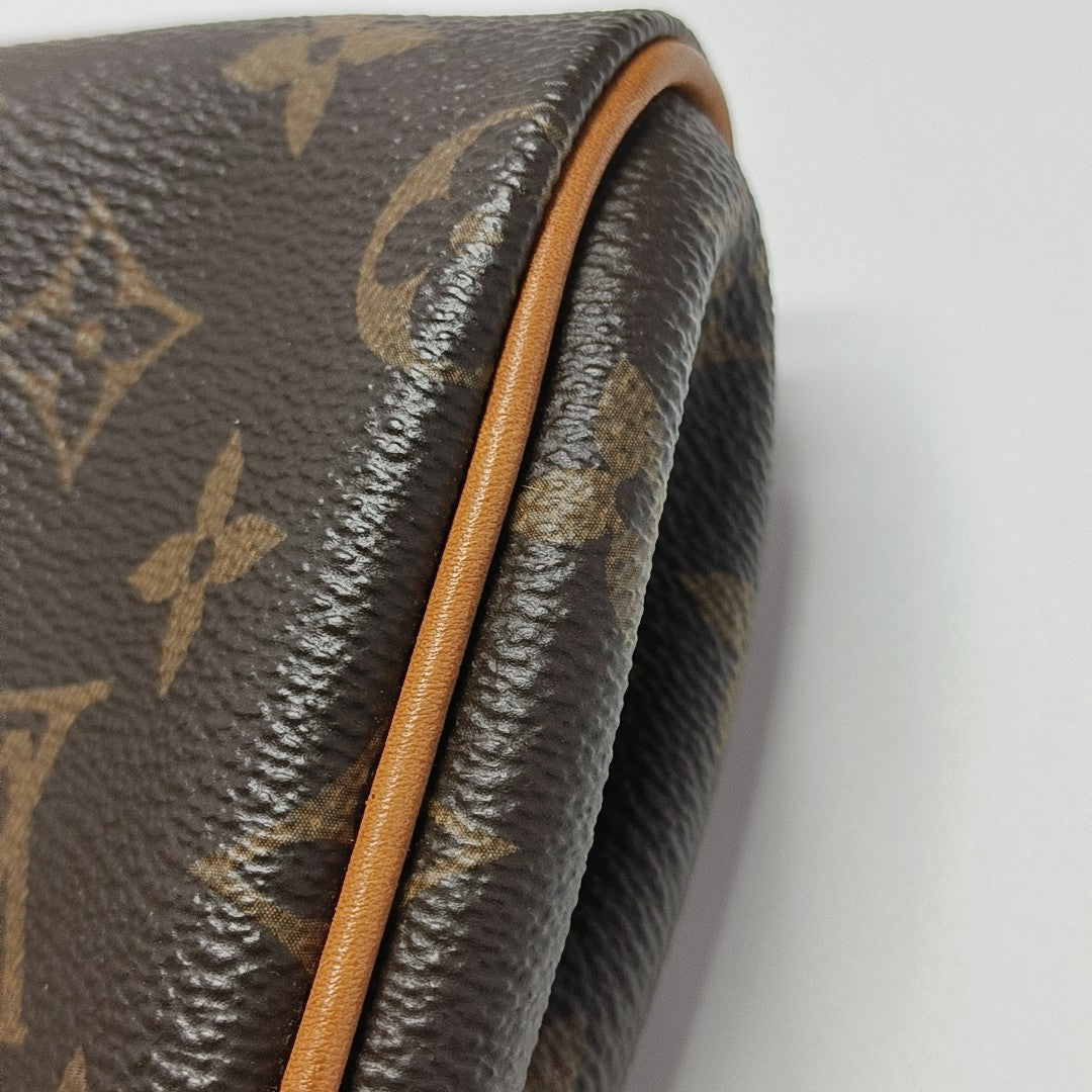 EVA Monogram Coated Canvas Brown