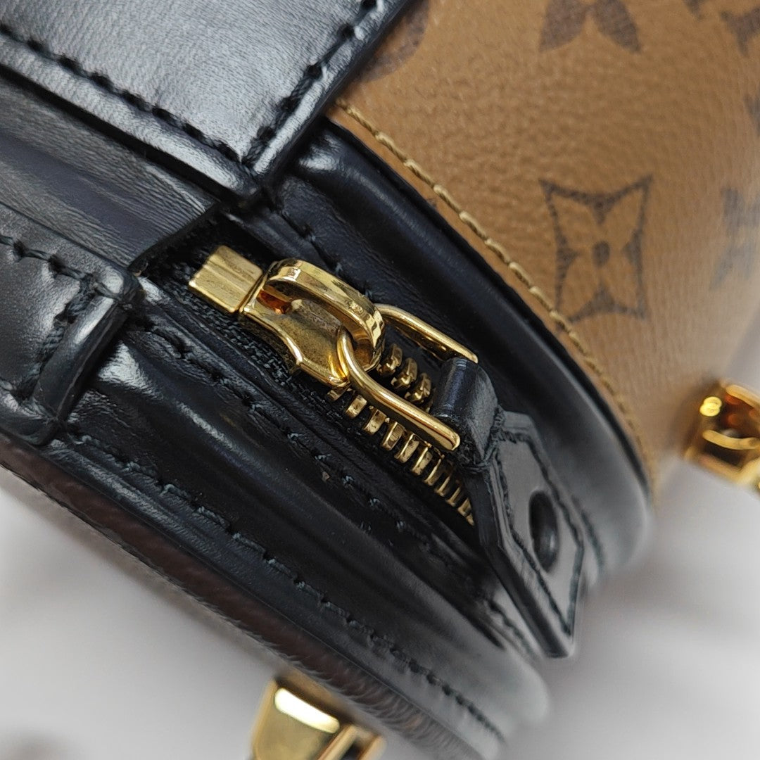 CANNES PM Monogram Coated Canvas Brown