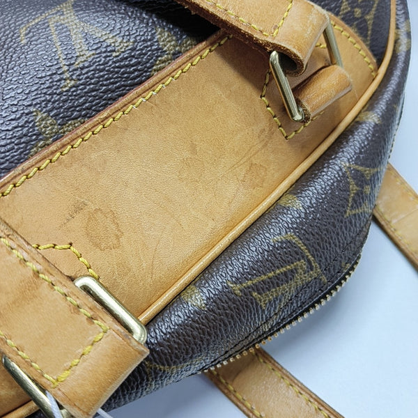 EXCURSION Monogram Coated Canvas Brown