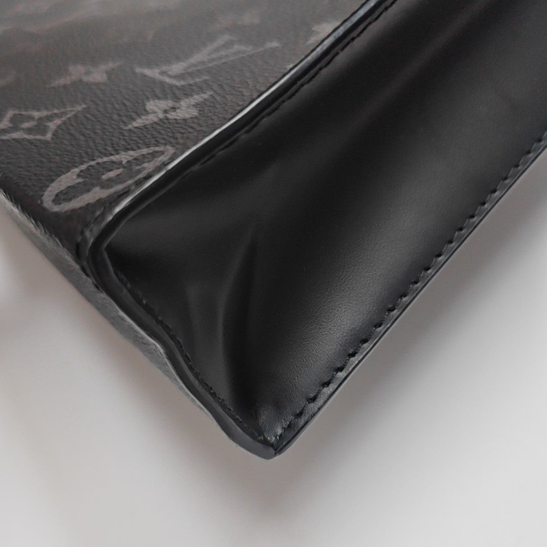 Pochette Voyag MM Monogram Coated Canvas Black