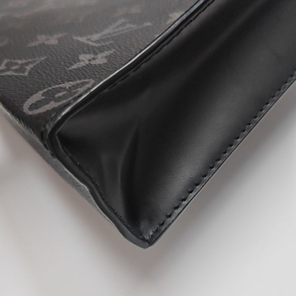 Pochette Voyag MM Monogram Coated Canvas Black