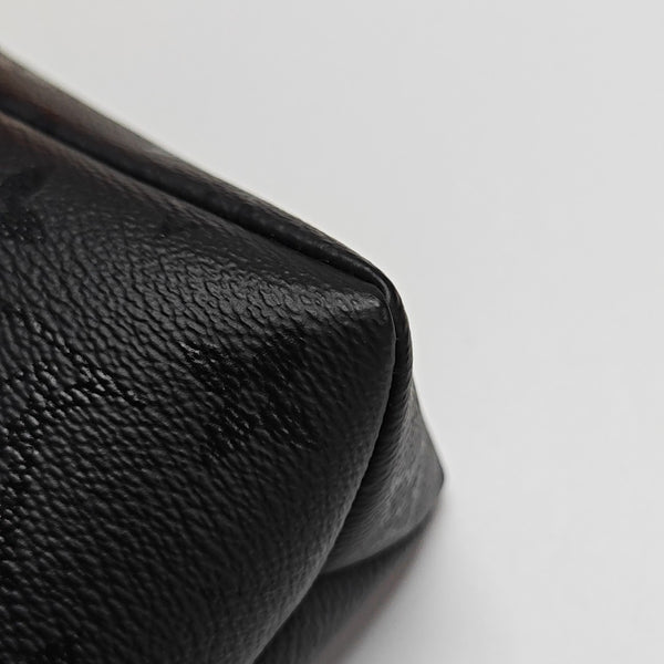 Pochette Voyag Monogram Coated Canvas Black
