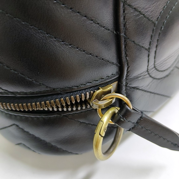 Authenticated pre-owned  GG Marmont Small Quilted Calfskin Black - Top Handle Bag at Looply