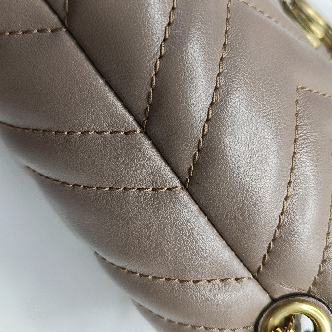 Authenticated pre-owned  GG Marmont Mini Quilted Calfskin Beige - Bucket Bag at Looply