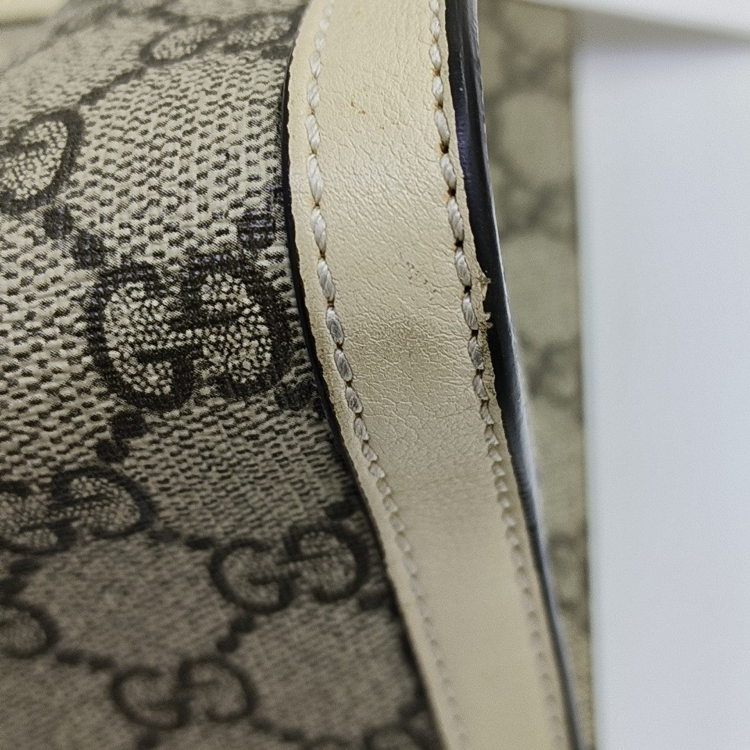 Padlock Small Monogram Coated Canvas Beige