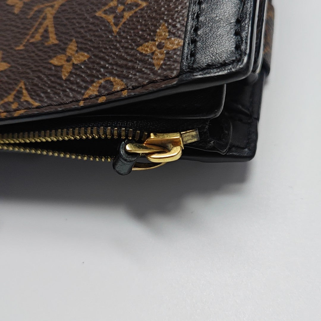 TRUNK Monogram Coated Canvas Brown