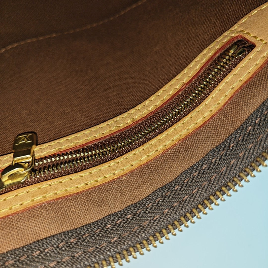 SPEEDY 25 Monogram Coated Canvas Brown