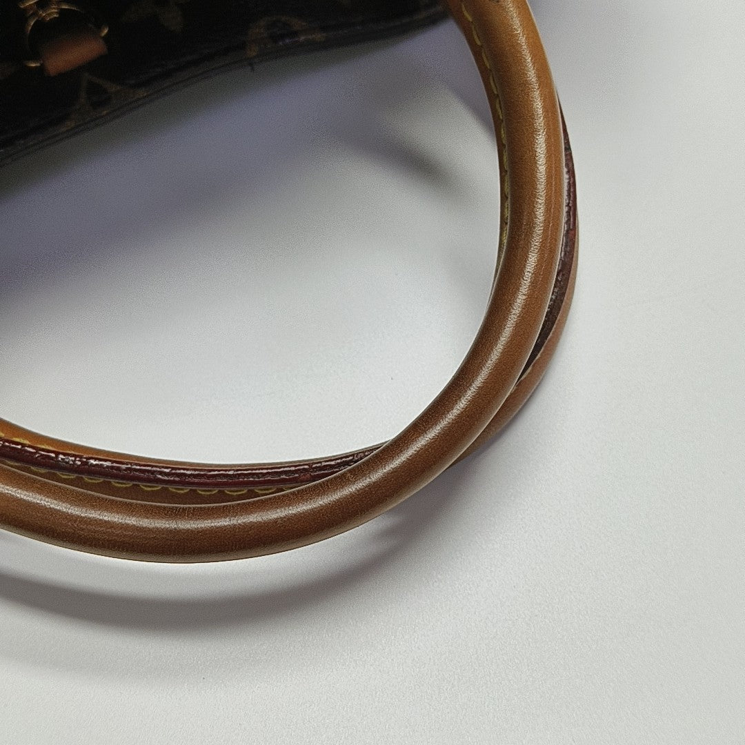 MONTAIGNE Monogram Coated Canvas Brown