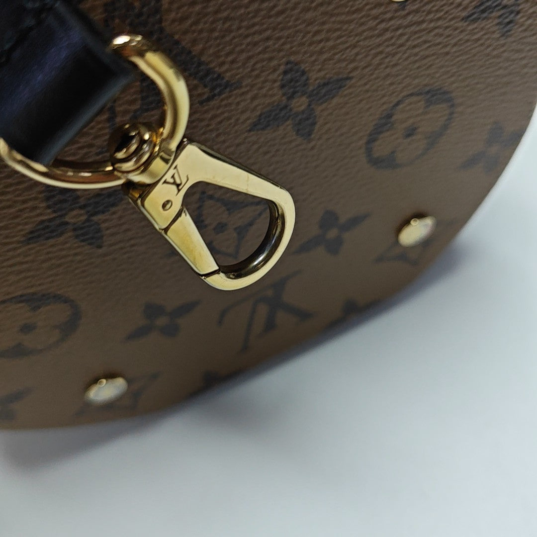 CANNES PM Monogram Coated Canvas Brown