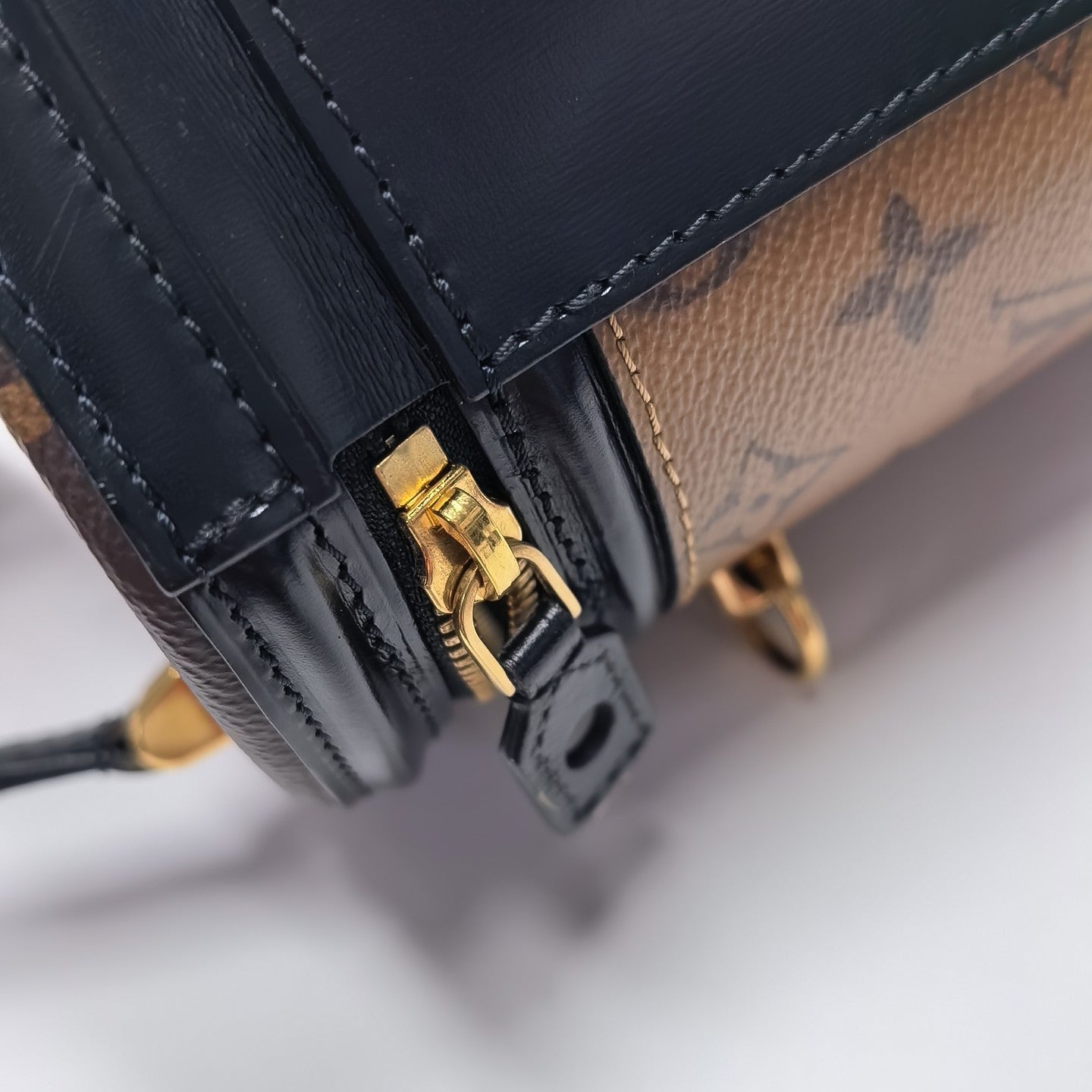 CANNES PM Monogram Coated Canvas Brown