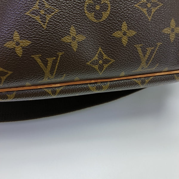 REPORTER PM Monogram Coated Canvas Brown