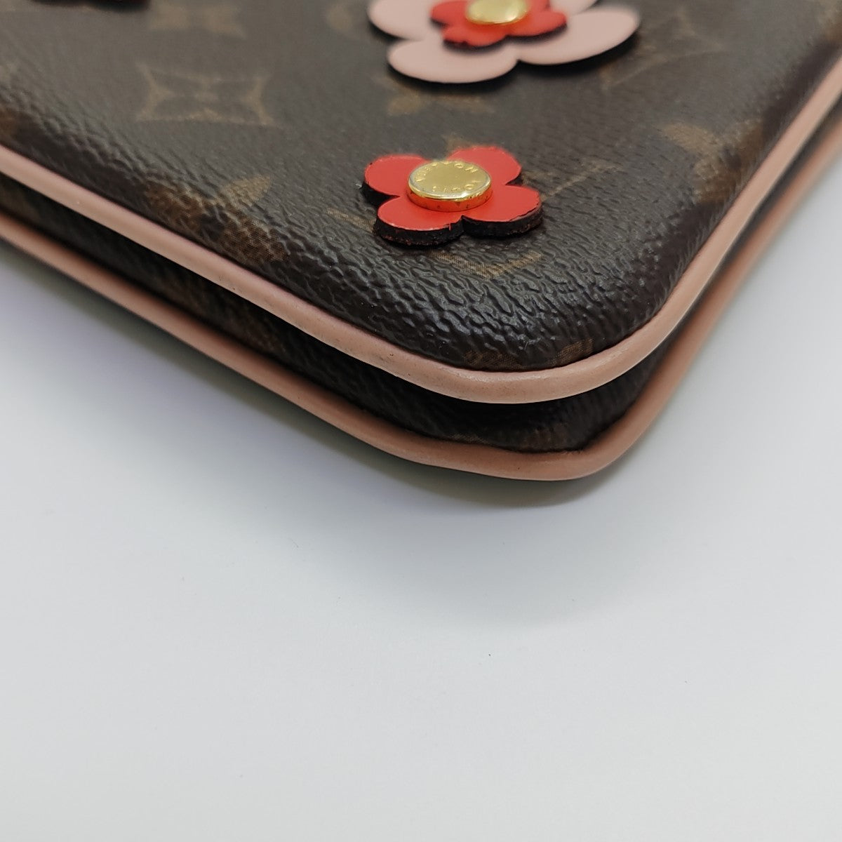 DOUBLE ZIP Monogram Coated Canvas Brown