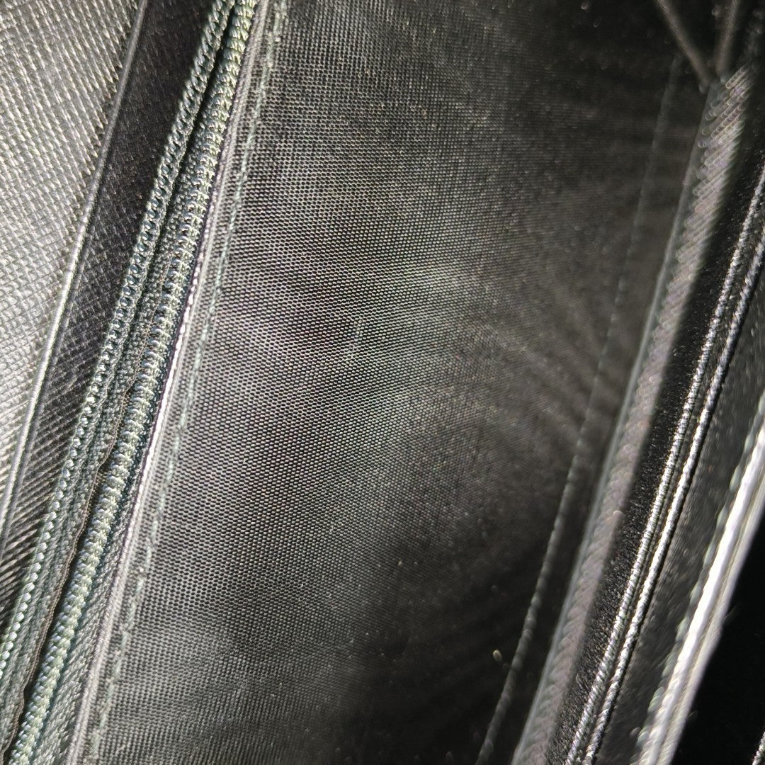 Authenticated pre-owned  Gancini Calfskin Black - Clutch at Looply