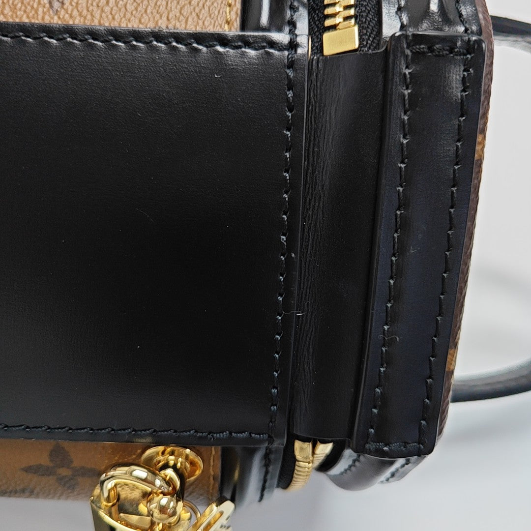 CANNES PM Monogram Coated Canvas Brown