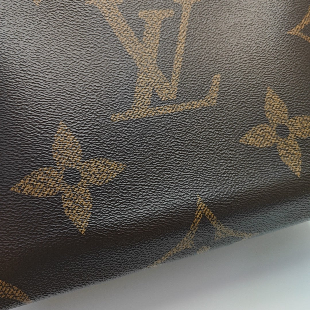 ONTHEGO MM Monogram Coated Canvas Brown