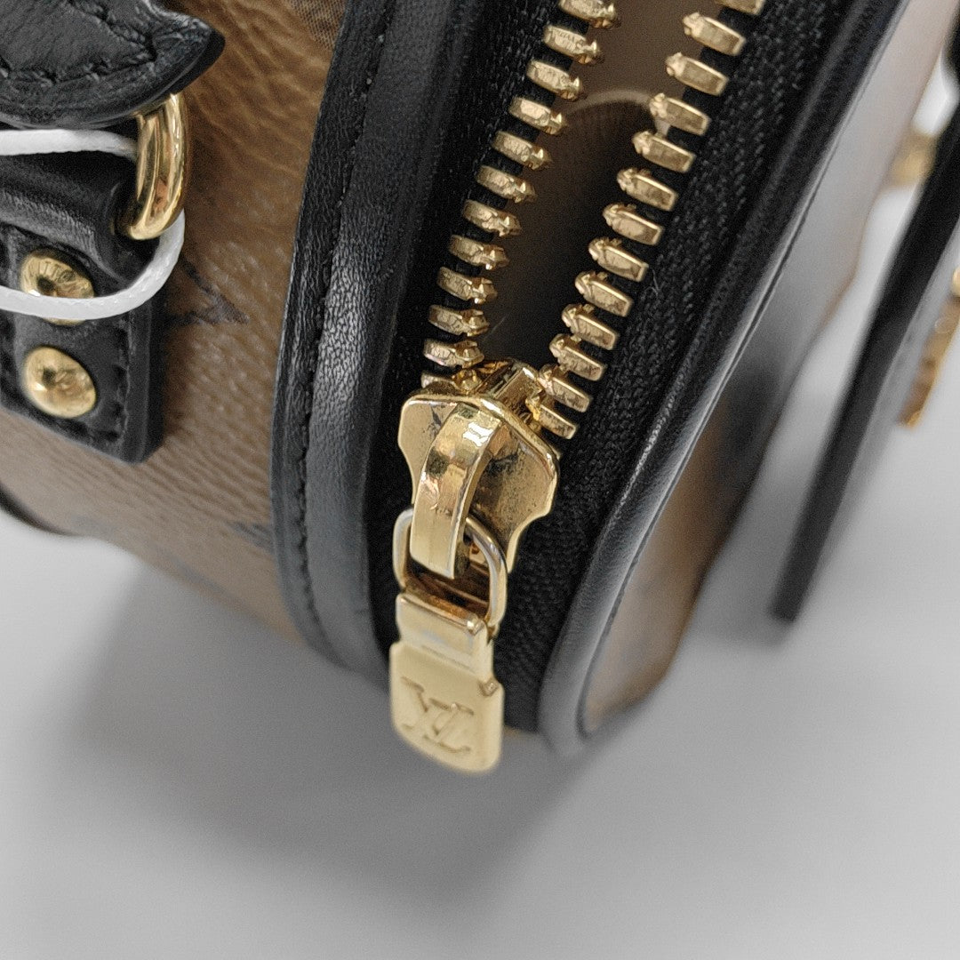 BOITE CHAPEAU Mini Monogram Coated Canvas Brown