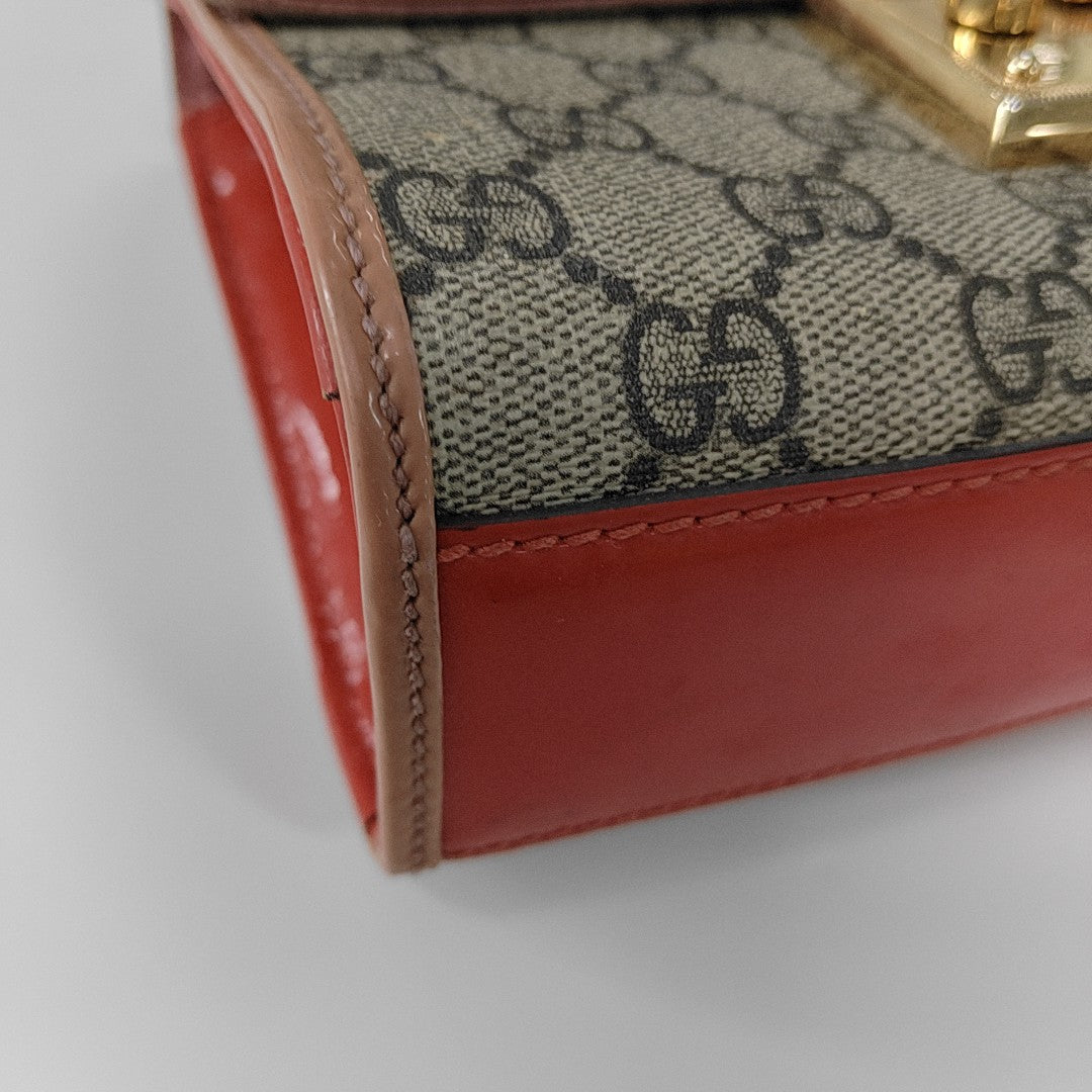 Candado pequeño Monogram lona revestida beige