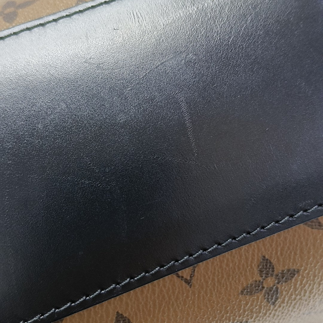 CANNES PM Monogram Coated Canvas Brown
