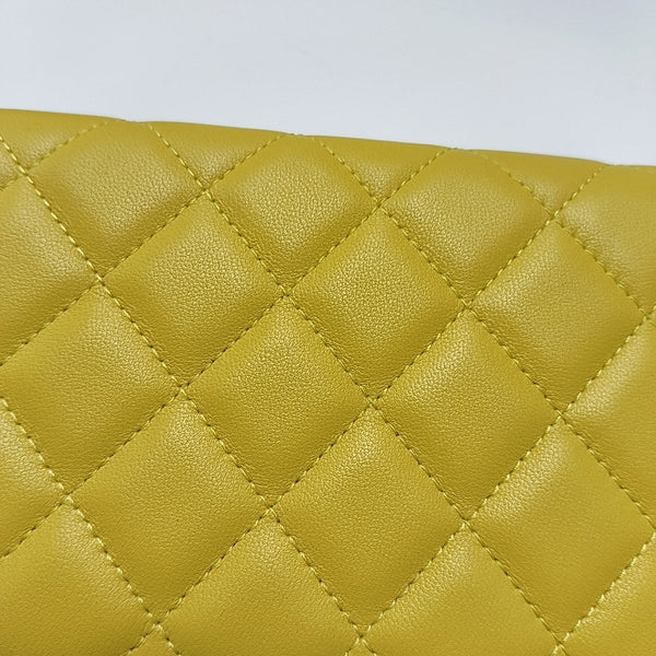 Authenticated pre-owned  WOC Quilted Lambskin Yellow Wallet - Wallet at Looply