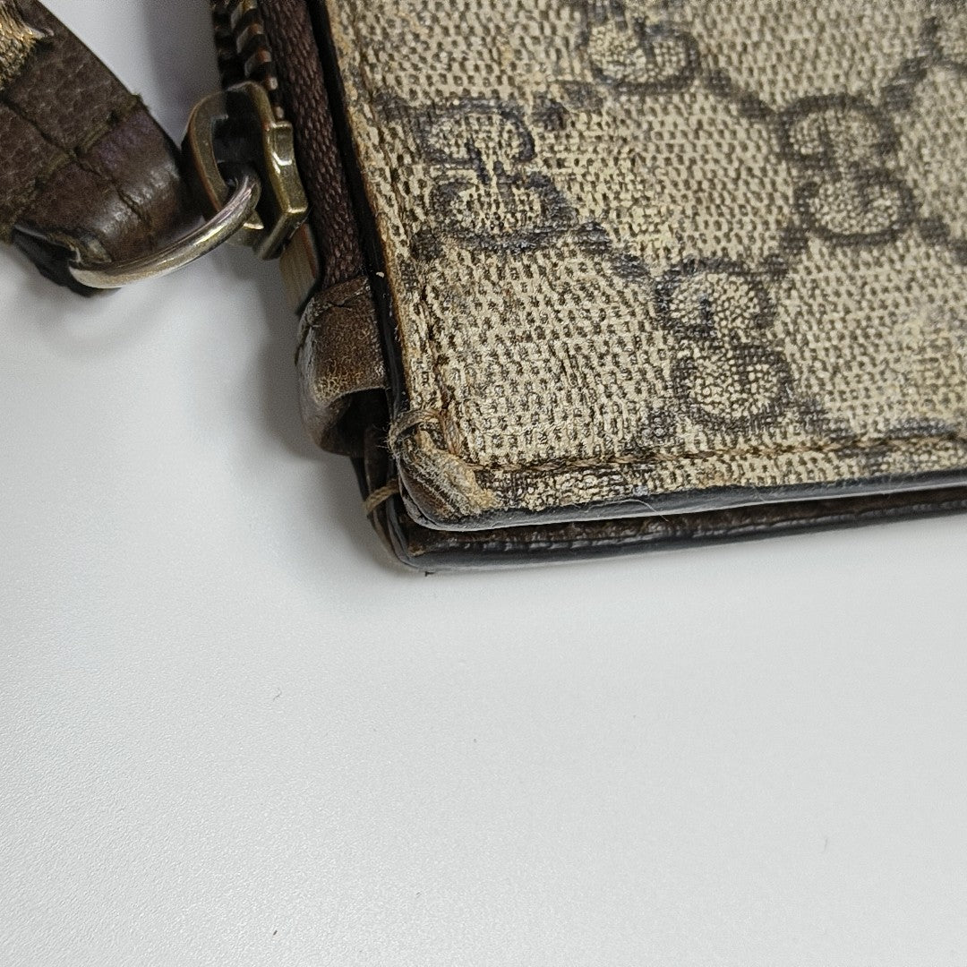 GG Supreme Monogram Coated Canvas Brown