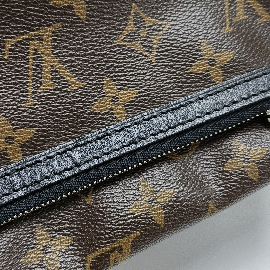 Monogram Coated Canvas Clutch Brown