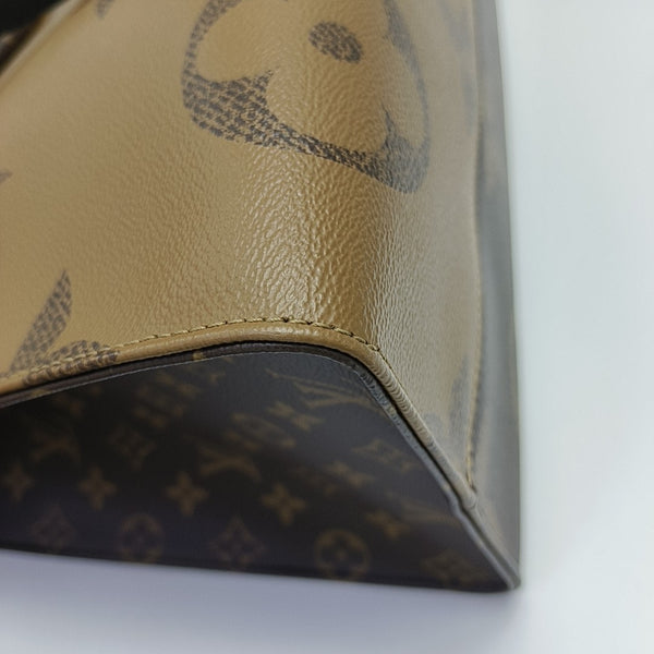 ONTHEGO GM Monogram Coated Canvas Brown