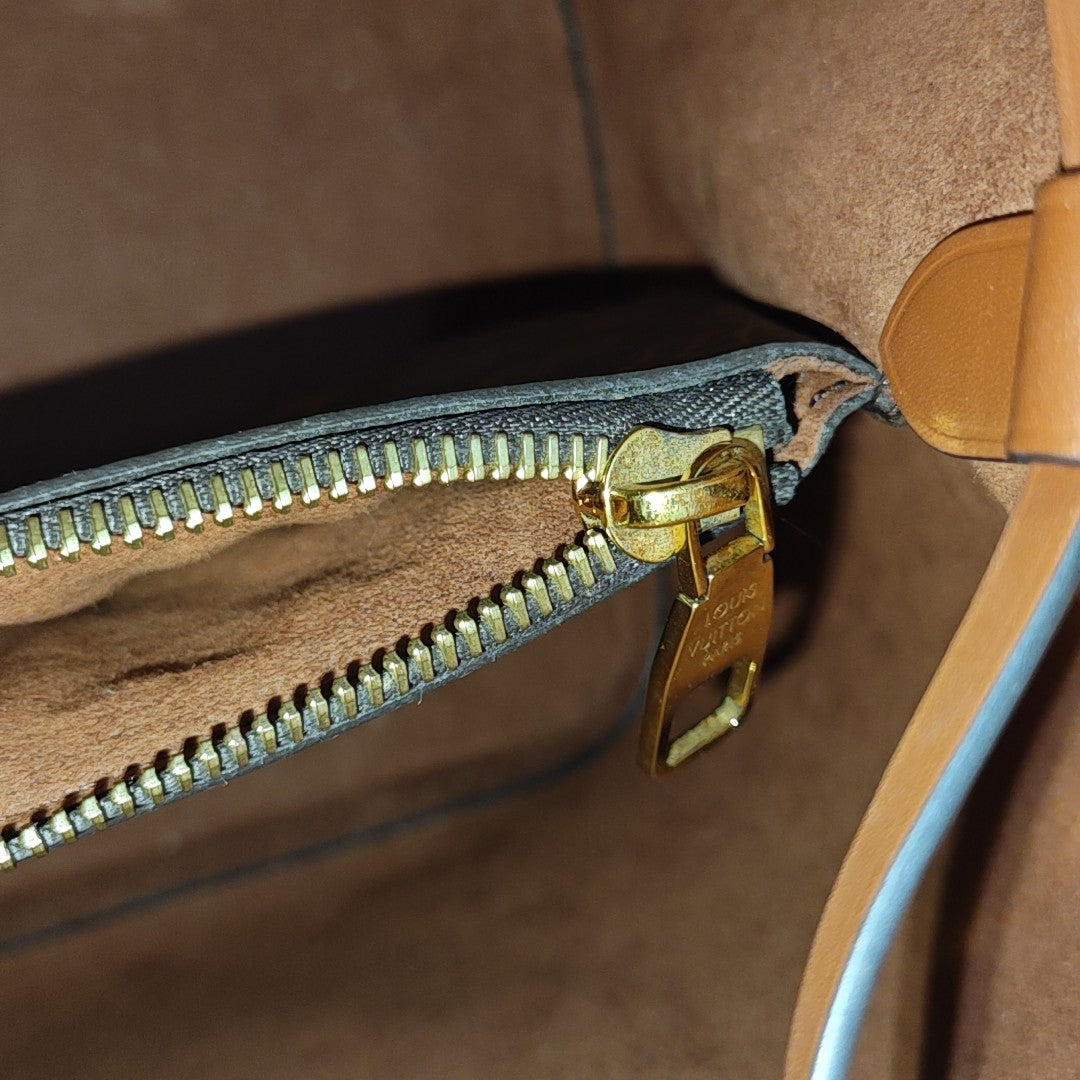 NÉONOÉ MM Monogram Coated Canvas Brown