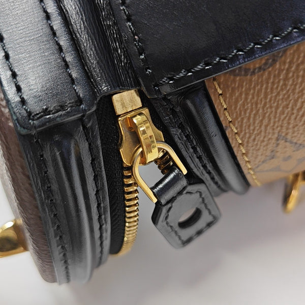 CANNES PM Monogram Coated Canvas Brown