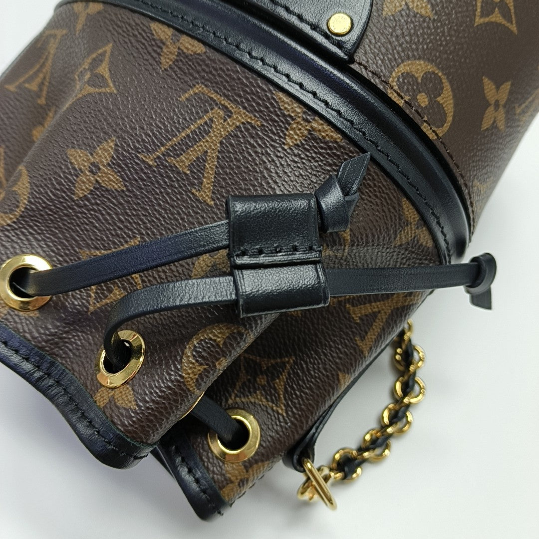 CANOÉ Monogram Coated Canvas Brown