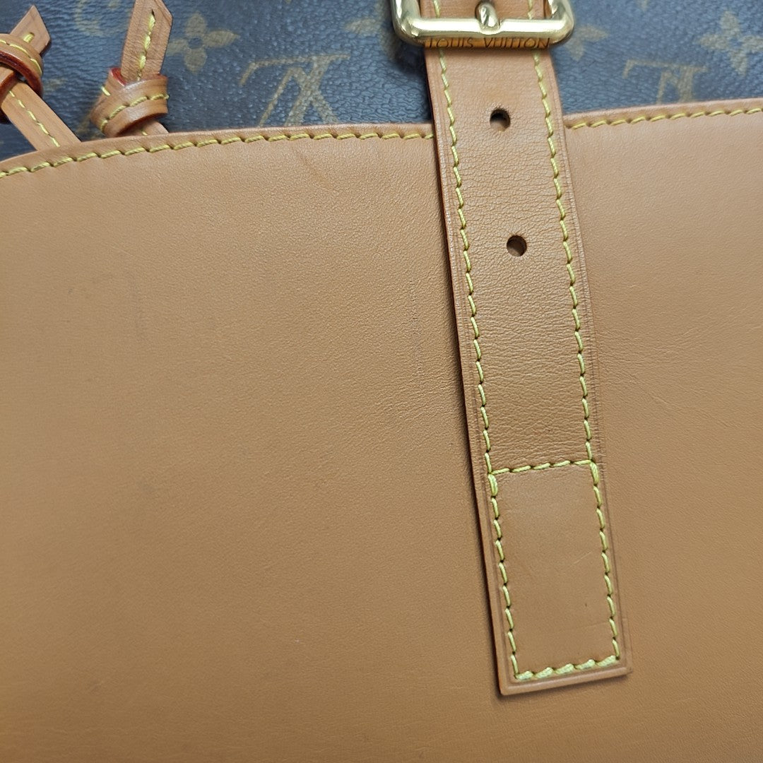 TRIO Monogram Coated Canvas Brown