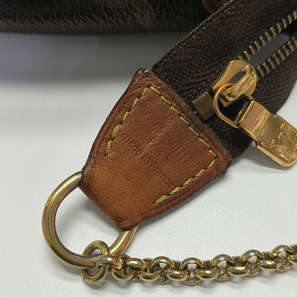 EVA Monogram Coated Canvas Brown