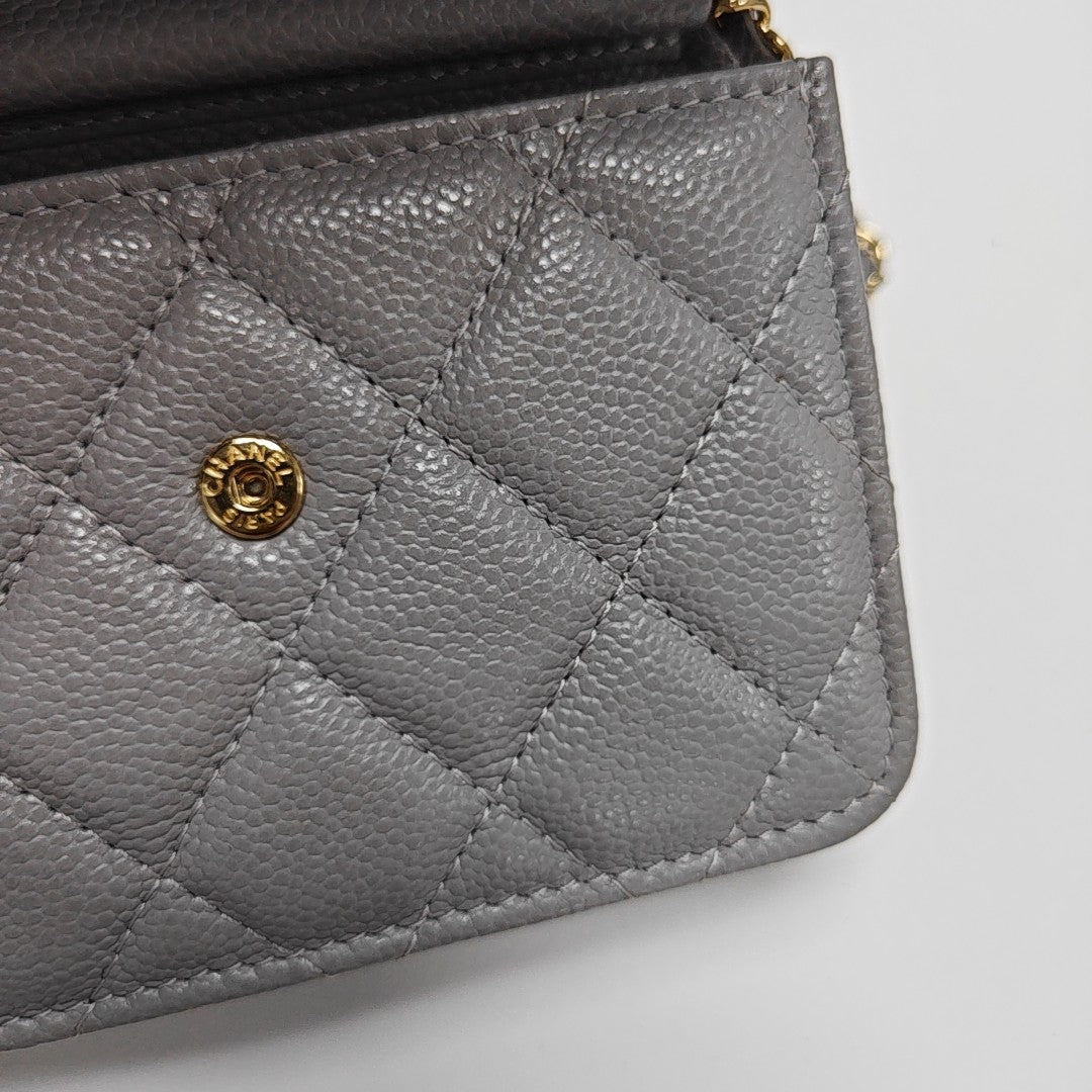 Authenticated pre-owned  WOC Quilted Grained Calfskin Grey - Shoulder Bag at Looply