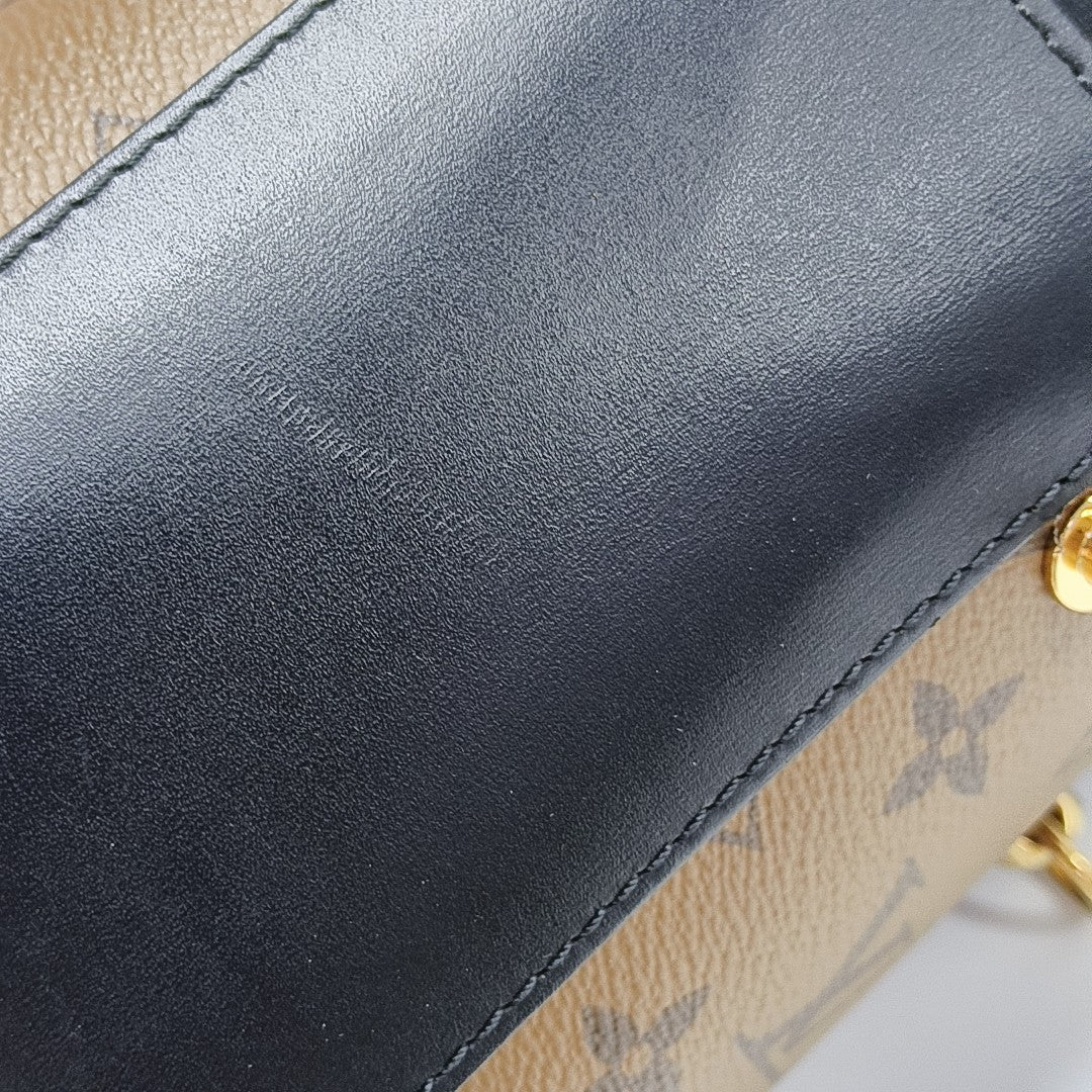 CANNES PM Monogram Coated Canvas Brown