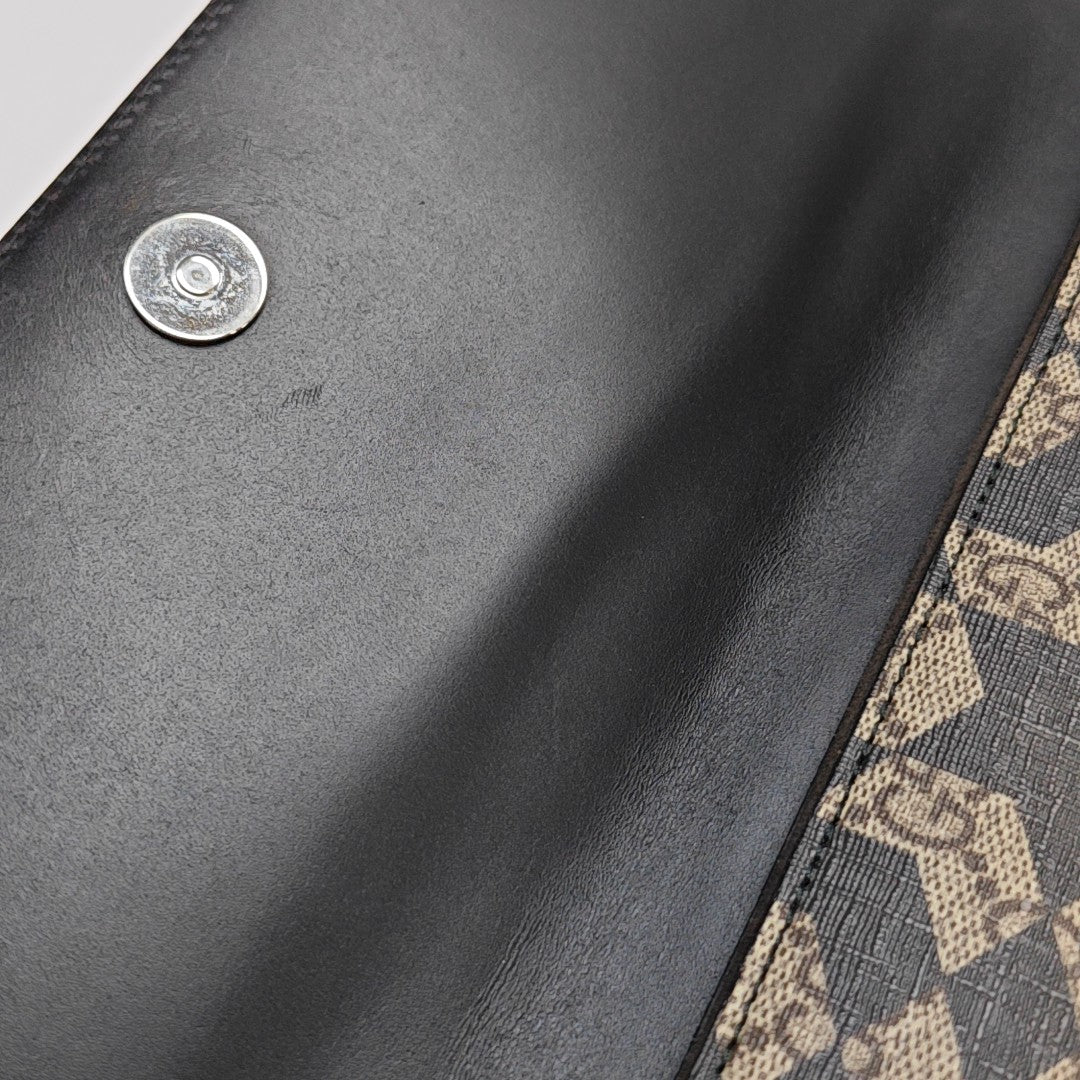 Monogram Coated Canvas Clutch Beige