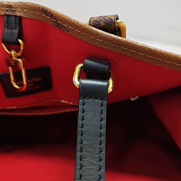 ONTHEGO MM Monogram Coated Canvas Brown