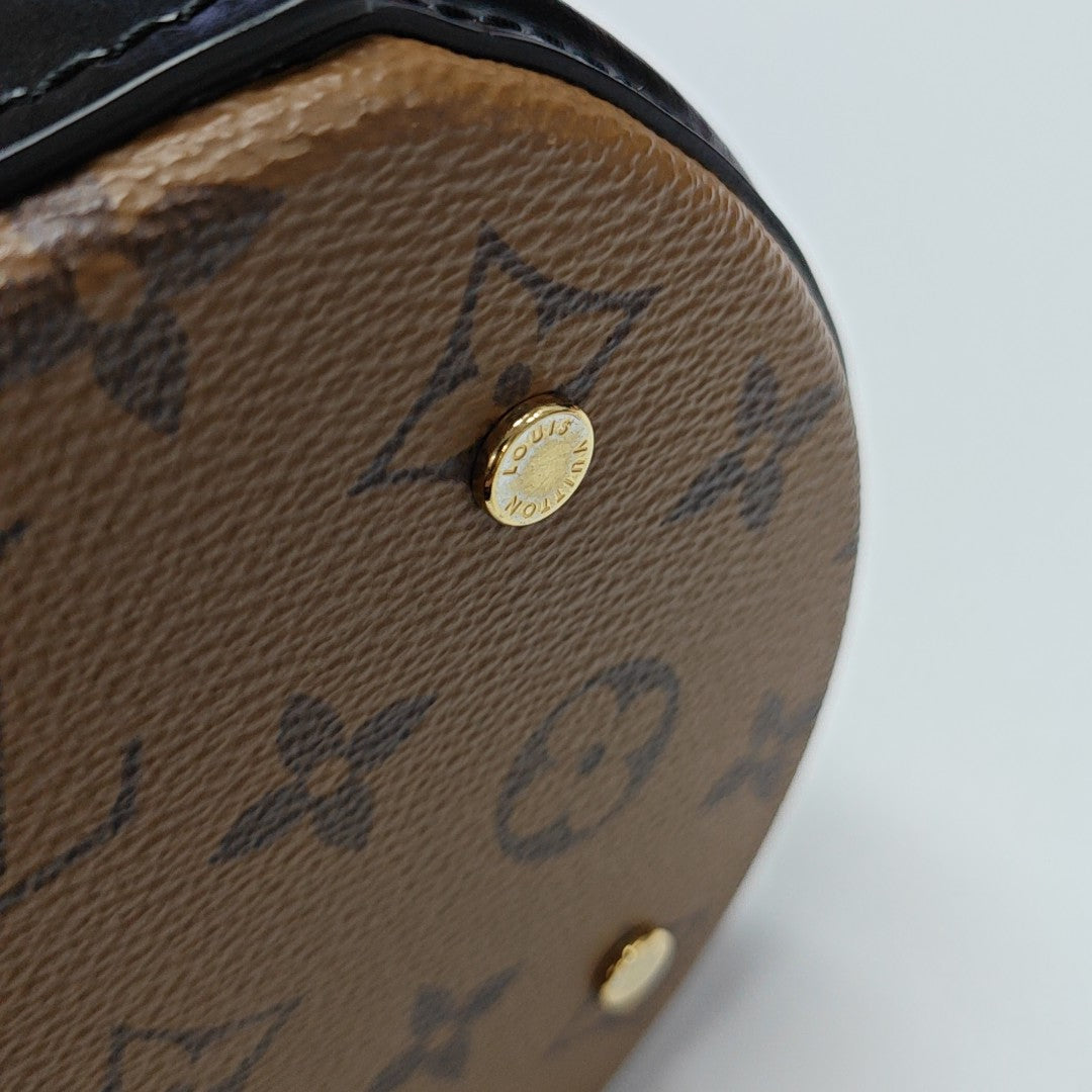 CANNES PM Monogram Coated Canvas Brown